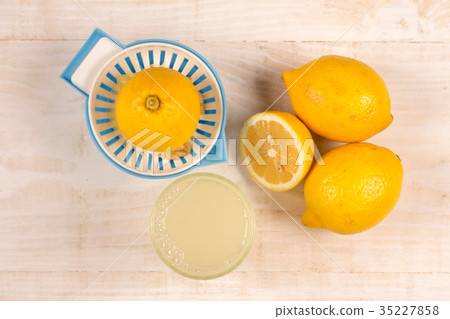 Freshly squeezed lemon and lemonade flay lay Freshly squeezed lemon and lemonade flay lay 35227858