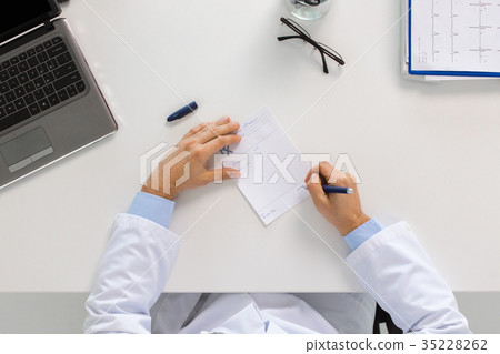 doctor hands with prescription at clinic doctor hands with prescription at clinic 35228262