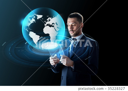 businessman with tablet pc and virtual globe 35228327