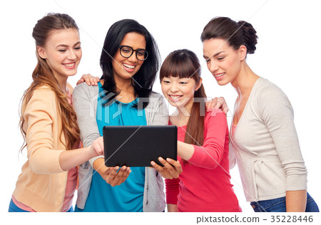 international group of happy women with tablet pc 35228446