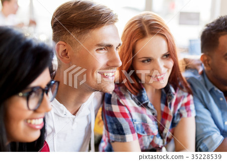 happy friends at restaurant happy friends at restaurant 35228539