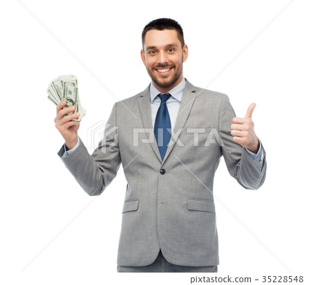 smiling businessman with american dollar money smiling businessman with american dollar money 35228548