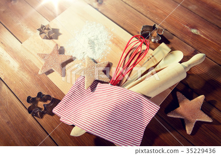 close up of gingerbread and baking kitchenware set close up of gingerbread and baking kitchenware set 35229436