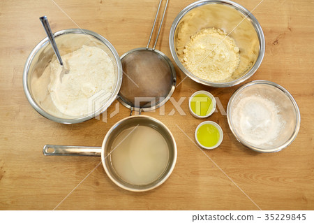 bowls with flour and egg whites at bakery kitchen bowls with flour and egg whites at bakery kitchen 35229845