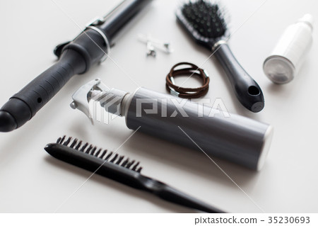 styling spay, brushes, hair ties and curling iron styling spay, brushes, hair ties and curling iron 35230693