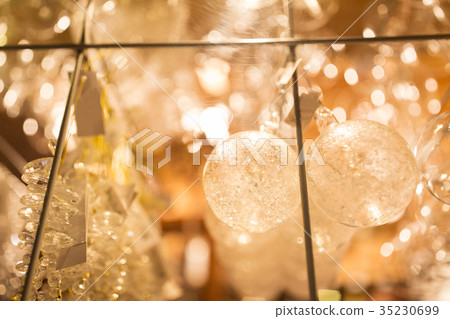 close up of christmas decorations at shop window close up of christmas decorations at shop window 35230699