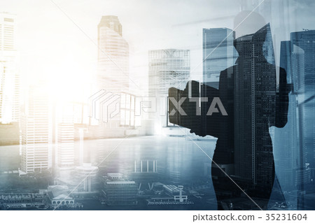 businesswoman or secretary over city background businesswoman or secretary over city background 35231604