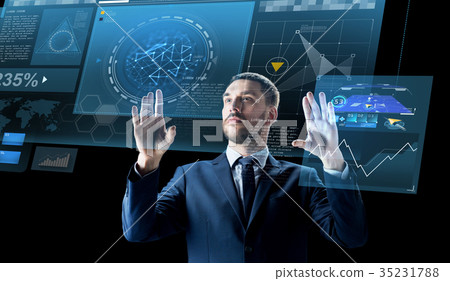 businessman with virtual projection over black businessman with virtual projection over black 35231788