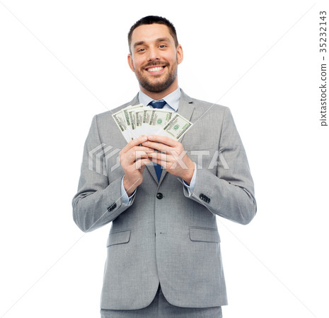 smiling businessman with american dollar money 35232143