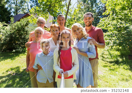 happy family taking selfie in summer garden happy family taking selfie in summer garden 35232148