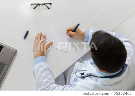 doctor hands with prescription at clinic 35232463