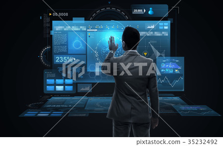 businessman working with virtual reality screens businessman working with virtual reality screens 35232492