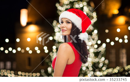 beautiful sexy woman in santa hat at christmas beautiful sexy woman in santa hat at christmas 35233745