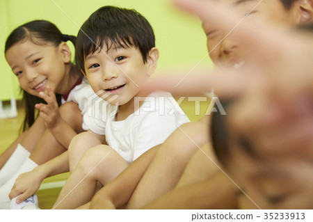 Gymnastics class physical education sitting children portrait 35233913