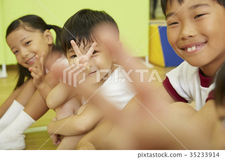 Gymnastics class physical education sitting children portrait 35233914
