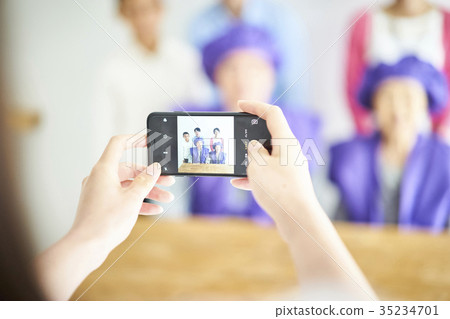 A woman to take with a smartphone 35234701