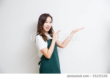 A woman in an apron A woman in an apron 35235109