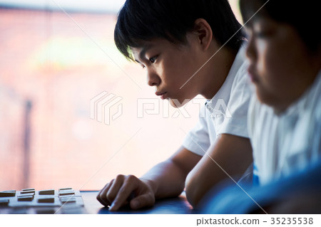 Boy pointing at shogi 35235538