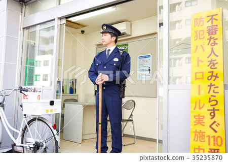 Policeman standing in front of the police box Policeman standing in front of the police box 35235870