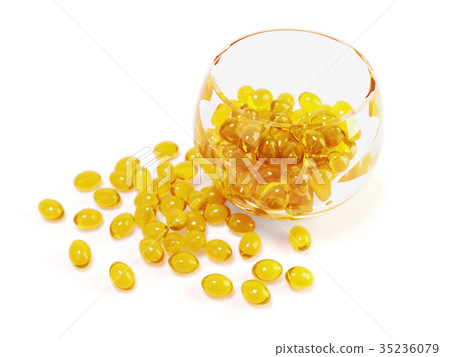 yellow fish oil capsules in glass bowl yellow fish oil capsules in glass bowl 35236079