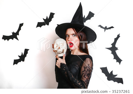 Happy gothic young woman in witch halloween Happy gothic young woman in witch halloween 35237261