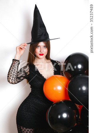 Portrait of beautiful young woman in black witch Portrait of beautiful young woman in black witch 35237489