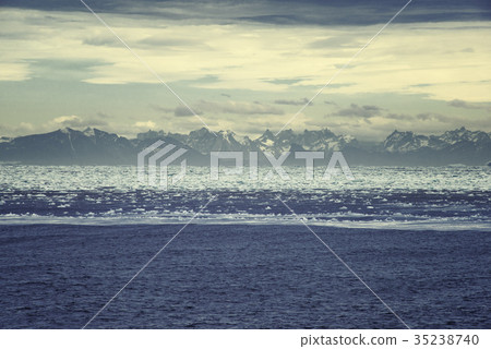 Sunrise over Greenland. High mountain range 35238740