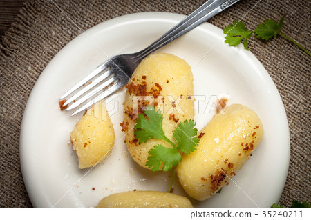 Potato dumplings stuffed with minced meat. Potato dumplings stuffed with minced meat. 35240211