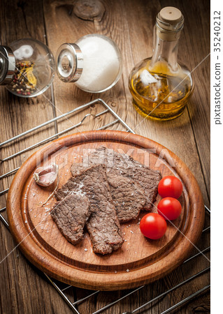 Slices of fried beef. Slices of fried beef. 35240212