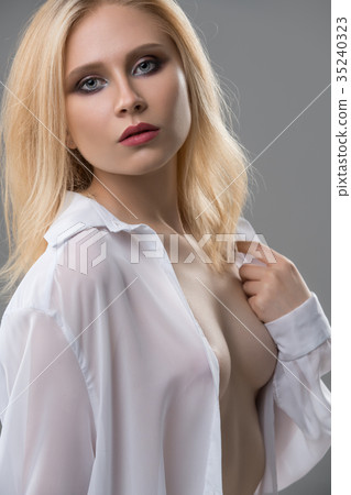 Attractive blonde topless portrait Attractive blonde topless portrait 35240323