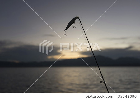 fishing bait on a sunset background of countryside fishing bait on a sunset background of countryside 35242096