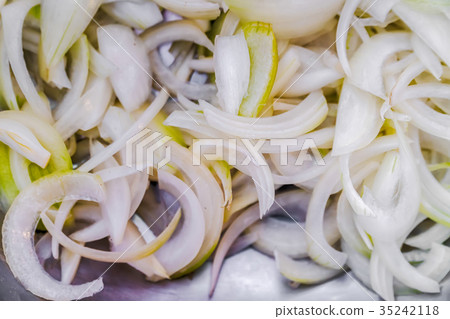 onion on wooden surface 35242118