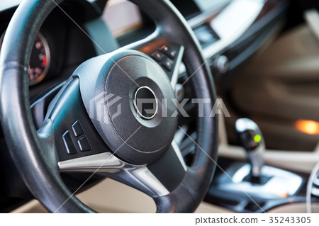 Interior view of car with luxery beige salon Interior view of car with luxery beige salon 35243305