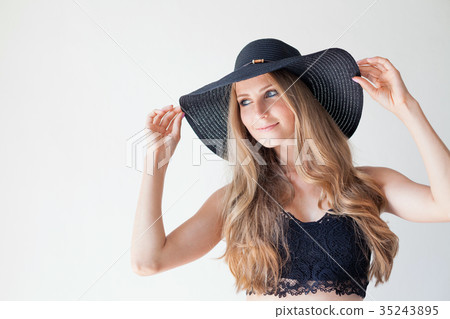 Portrait of fashionable girl in hat with large Portrait of fashionable girl in hat with large 35243895