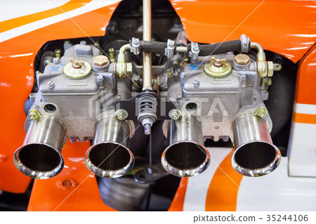 Old engine on a racing car such as formula Old engine on a racing car such as formula 35244106