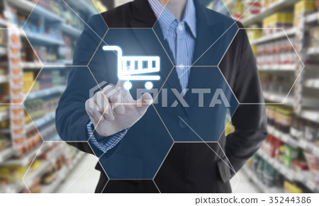 Businessman hand pressing button add to cart. Businessman hand pressing button add to cart. 35244386