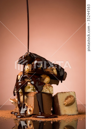 Pile of broken chocolate Pile of broken chocolate 35244563