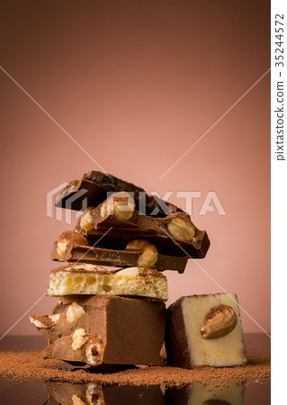 Pile of broken chocolate Pile of broken chocolate 35244572
