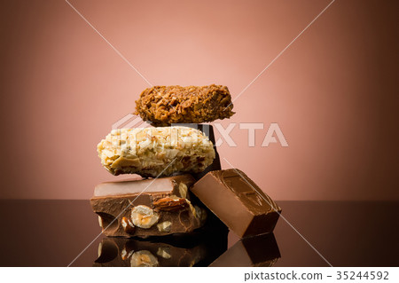 Pile of broken chocolate Pile of broken chocolate 35244592