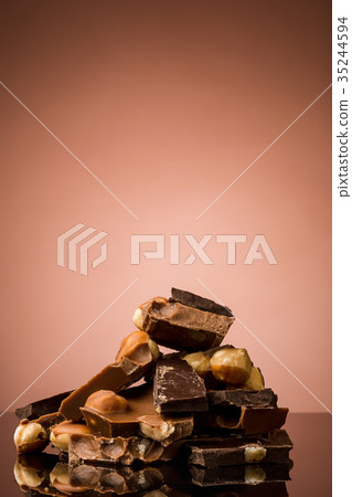 Pile of broken chocolate Pile of broken chocolate 35244594