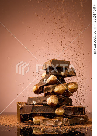 Pile of broken chocolate 35244597
