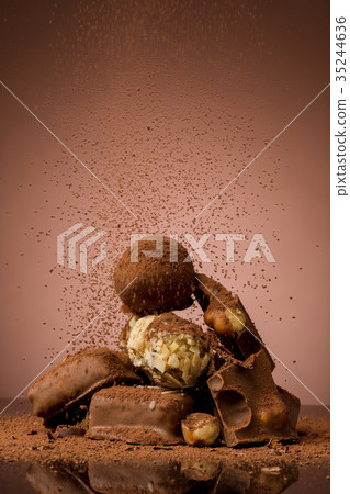 Pile of broken chocolate 35244636