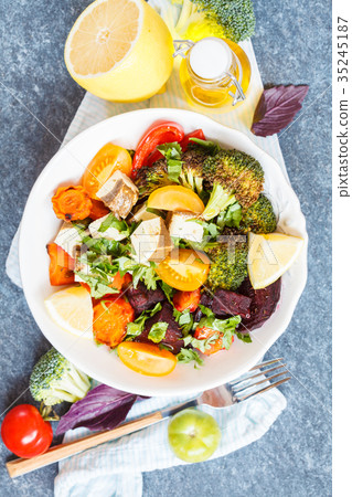 Vegetarian salad of baked vegetables and tofu Vegetarian salad of baked vegetables and tofu 35245187