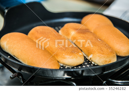 The chef in the kitchen prepares food with The chef in the kitchen prepares food with 35246282