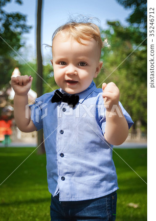 baby walking in the park 35246712