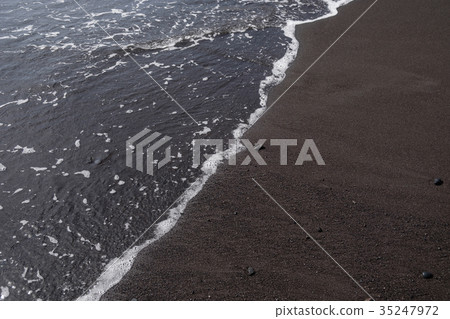 ocean water on black sand 35247972