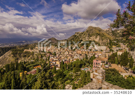 view of city of Taormina from its Greek theatre view of city of Taormina from its Greek theatre 35248610