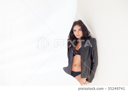 beautiful girl in black lingerie standing by the beautiful girl in black lingerie standing by the 35249741