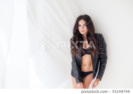 beautiful girl in black lingerie standing by the beautiful girl in black lingerie standing by the 35249749