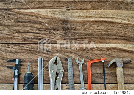 Work Tools frame on wood background Work Tools frame on wood background 35249842